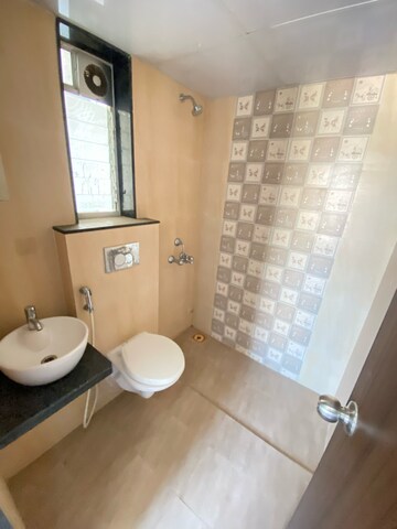 Bathroom in 1 BHK Apartment at JP North Imperia, Hatkesh Udhog Nagar – for Rent
