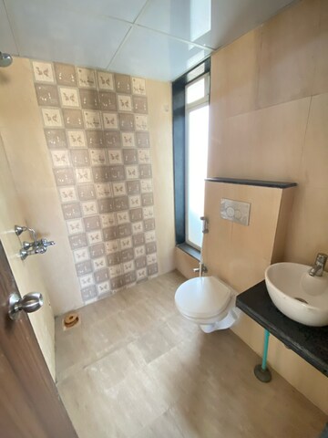 Bathroom in 1 BHK Apartment at JP North Imperia, Hatkesh Udhog Nagar – for Rent