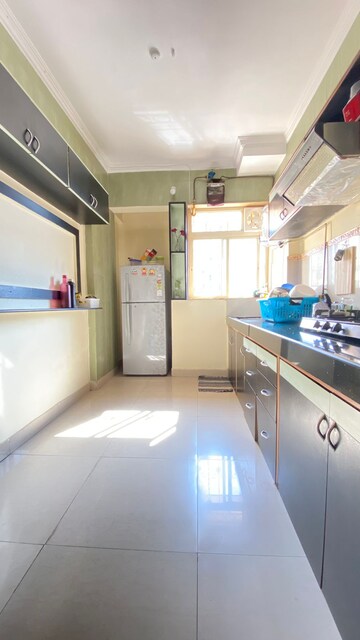 Kitchen in 2 BHK Apartment at Kanakia Spaces Niharika, Manpada – for Rent