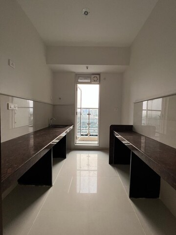 Kitchen in 1 BHK Apartment at Parsik Nagar – for Sale