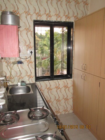 Living Room in 1 BHK Apartment at Nishant Building, Andheri West – for Rent