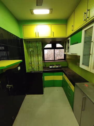 Kitchen in 1 BHK Apartment at Green Fields Apartment, Andheri East – for Rent