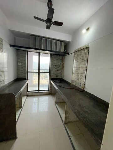Kitchen in 2 BHK Apartment at Gaurav Woods Phase I, Mira Road – for Rent