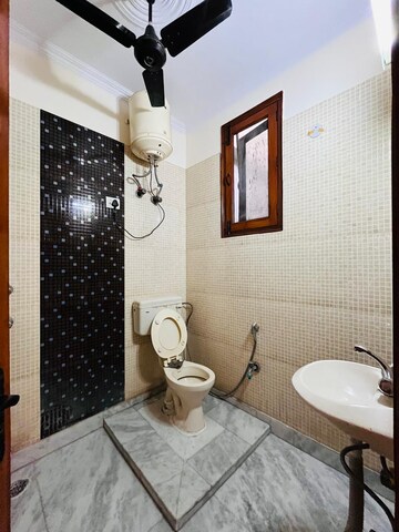 Bathroom in 3 BHK Builder Floor at Sant Nagar – for Rent