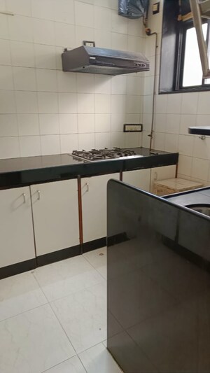 Kitchen in 2 BHK Apartment at Marine Drive – for Sale