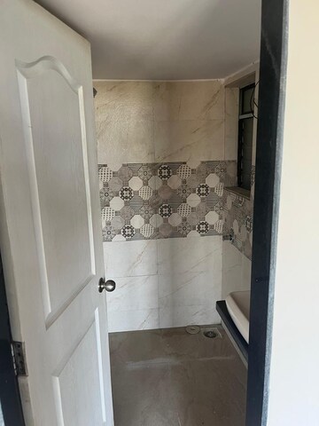 Bathroom in 1 BHK Apartment at Sanghvi S3 Ecocity Orchid, Mahajanwadi – for Rent