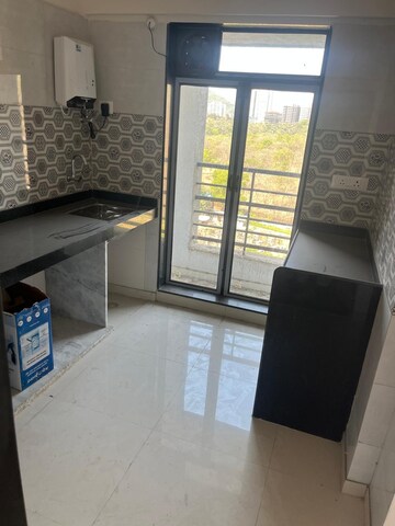 Kitchen in 1 BHK Apartment at Sanghvi S3 Ecocity Orchid, Mahajanwadi – for Rent