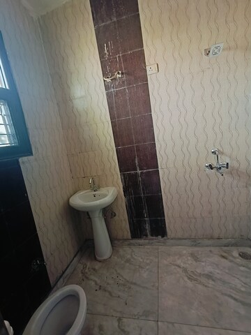 Bathroom in 3 BHK Apartment at Sunny Enclave – for Rent