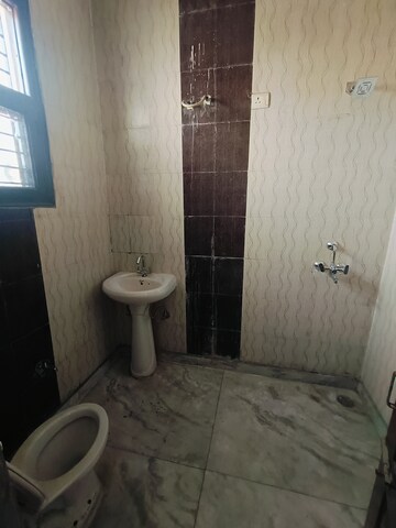 Bathroom in 3 BHK Apartment at Sunny Enclave – for Rent