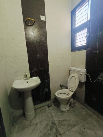 Bathroom in 3 BHK Apartment at Sunny Enclave – for Rent