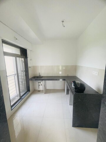 Kitchen in 3 BHK Apartment at Vikas Palms Row Houses, Khopat – for Rent