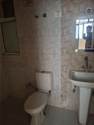 Bathroom in 2 BHK Apartment at SCC Heights, Raj Nagar Extension – for Sale