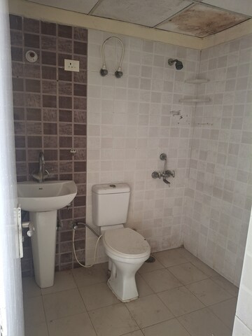 Bathroom in 2 BHK Apartment at SCC Heights, Raj Nagar Extension – for Sale