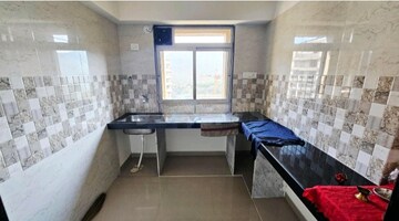 Kitchen in 2 BHK Apartment at Cosmos Jewels Solitaire, Ghodbunder Road – for Rent