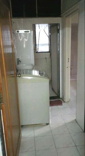 Bathroom in 1 BHK Apartment at Coral Heights, Kavesar – for Rent