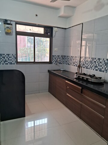 Kitchen in 2 BHK Apartment at Uma Sadan Chembur, Chembur – for Sale