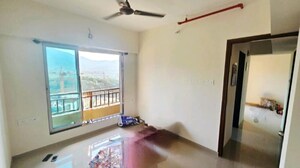 Living Room in 1 BHK Apartment at Squarefeet Ace Square phase 2, Ghodbunder Road – for Sale