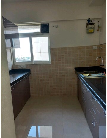 Kitchen in 2 BHK Apartment at Puranik Capitol, Ghodbunder Road – for Rent