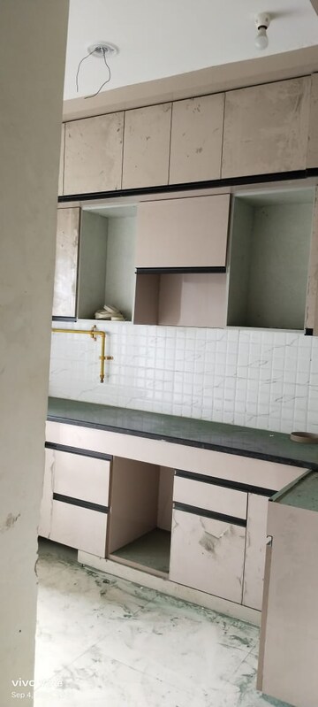 Kitchen in 2 BHK Apartment at SG Grand, Raj Nagar Extension – for Rent