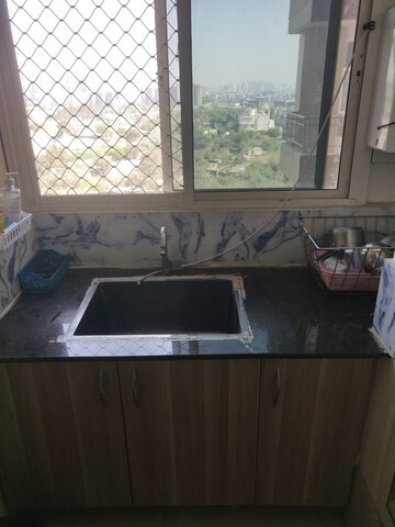 Kitchen in 2 BHK Apartment at Antriksh Golf View, Sector 78 – for Rent