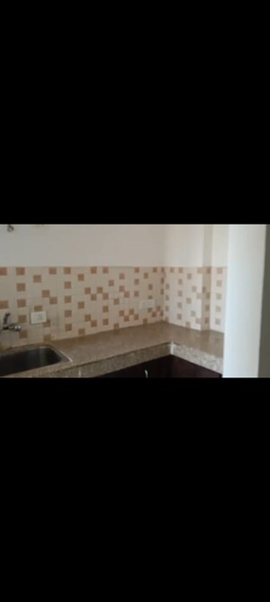 Kitchen in 2 BHK Apartment at SCC Sapphire, Raj Nagar Extension – for Sale