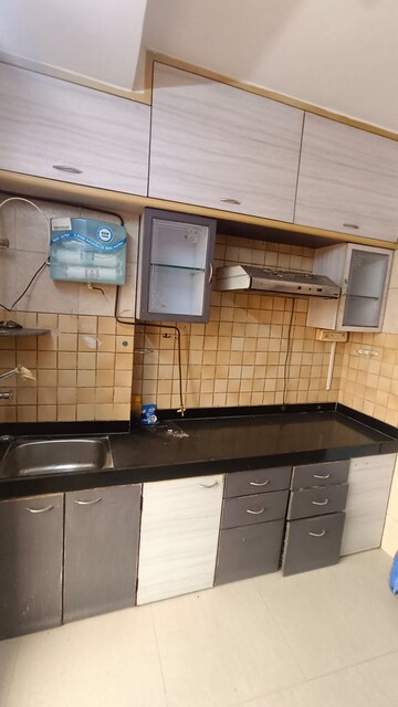 Kitchen in 2 BHK Apartment at Maharaja Retreat CHS, Goregaon East – for Rent