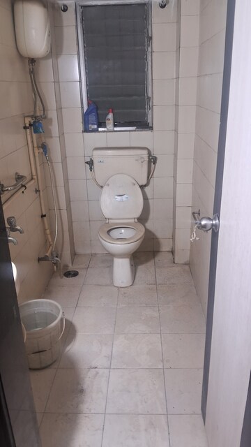 Bathroom in 3 BHK Apartment at Mittal Tower CHS, Kopar Khairane – for Rent
