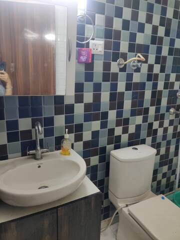 Bathroom in 2 BHK Apartment at AFOWO Raksha Addela, Sector 16c Greater Noida – for Rent