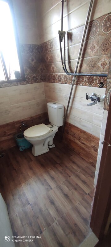 Bathroom in 3 BHK Builder Floor at Dhakoli – for Sale