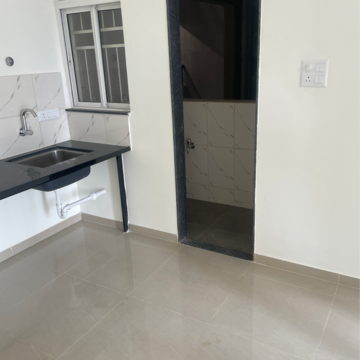 Kitchen in 1 BHK Apartment at Kolte Patil Life Republic 16th Avenue Arezo, Marunji – for Rent