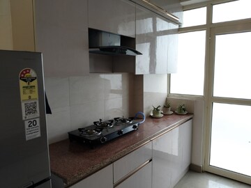 Kitchen in 2 BHK Apartment at Suncity Avenue 76, Sector 76 – for Rent