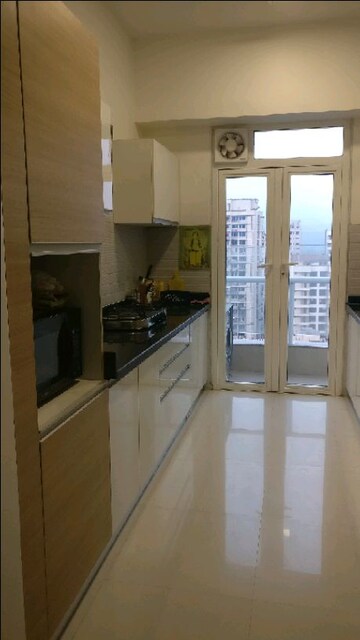 Kitchen in 3 BHK Apartment at Omkar Alta Monte, Malad East – for Rent