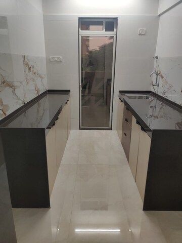 Kitchen in 2 BHK Apartment at Radheya Sai Enclave, Naigaon East – for Sale