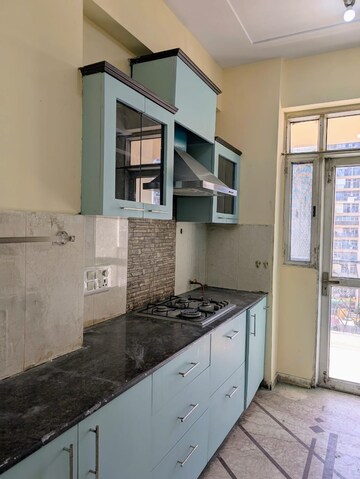 Kitchen in 3 BHK Apartment at Prateek The Royal Cliff, Sain Vihar – for Rent