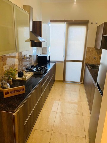 Kitchen in 3 BHK Apartment at Sushma Crescent, Dhakoli – for Sale