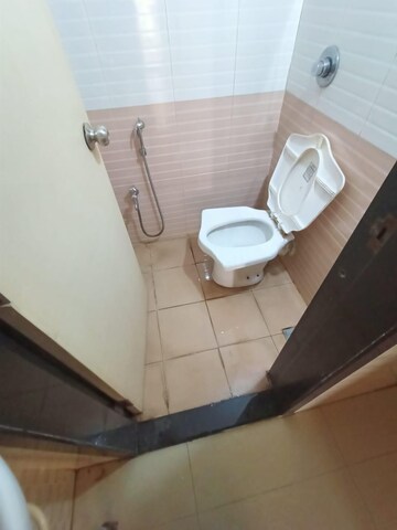 Bathroom in 1 BHK Apartment at Nisarg Hyde Park, Kharghar – for Rent