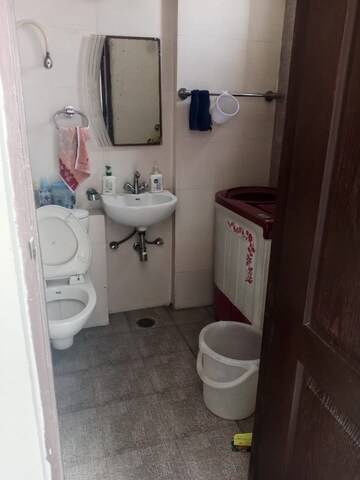Bathroom in 3 BHK Apartment at Paramount Symphony, Sain Vihar – for Rent