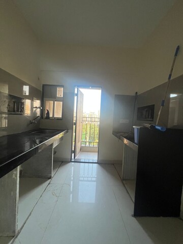 Kitchen in 1 BHK Apartment at Parsik Nagar – for Sale