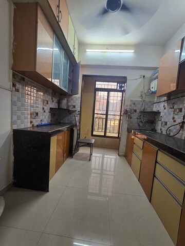 Kitchen in 1 BHK Apartment at Parsik Nagar – for Sale