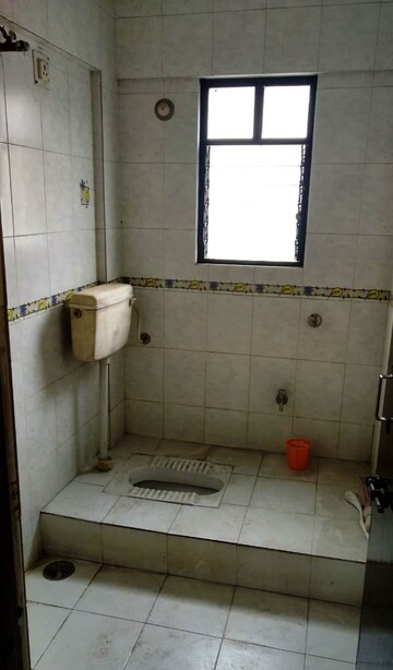 Bathroom in 2 BHK Apartment at Basera CHS Karve Nagar, Karve Nagar – for Rent