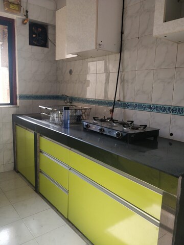 Kitchen in 3 BHK Apartment at Hiranandani Garden Brentwood, Powai – for Rent