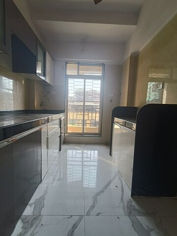 Kitchen in 1 BHK Apartment at RNA NG Diamond Hill Phase III, Beverly Park – for Rent