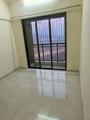 Room in 2 BHK Apartment at Sunteck One World, Naigaon East – for Sale
