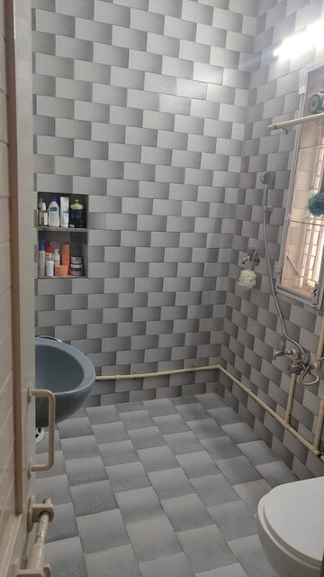 Bathroom in 2 BHK Apartment at RWA Munirka Village, Munirka – for Rent