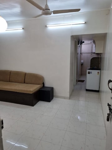 Living Room in 1 BHK Apartment at Bandra West – for Rent