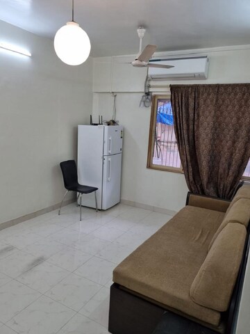 Living Room in 1 BHK Apartment at Bandra West – for Rent