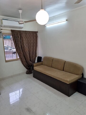 Living Room in 1 BHK Apartment at Bandra West – for Rent