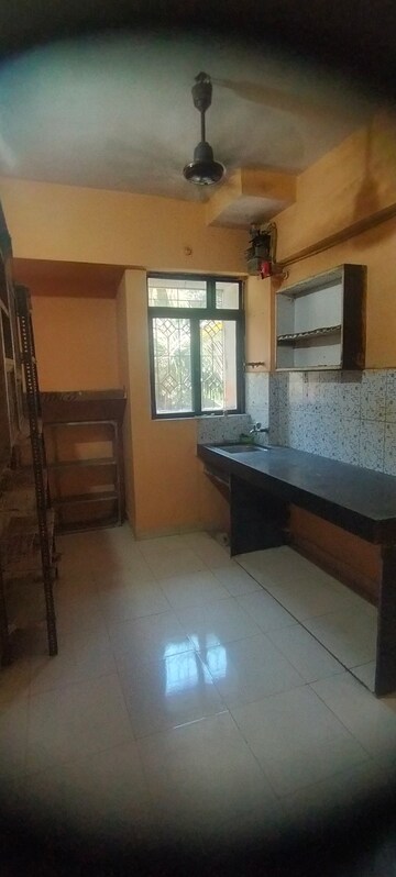 Kitchen in 1 BHK Apartment at Krishna Greenland Park Vastu Federation, Ghodbunder Road – for Rent