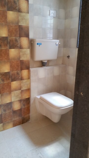 Bathroom in 2 BHK Apartment at Man Opus, Mira Road – for Rent
