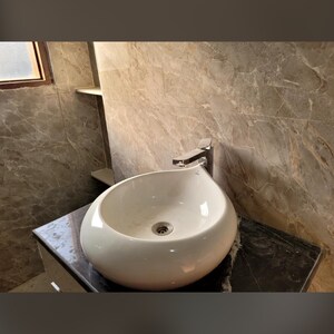 Bathroom in 3.5 BHK Builder Floor at Green Fields Colony – for Sale